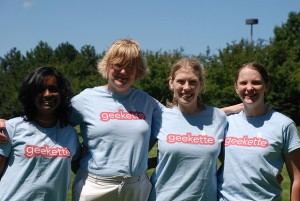 4 geekettes wearing light blue shirts with "geekette" in pink bubble letters